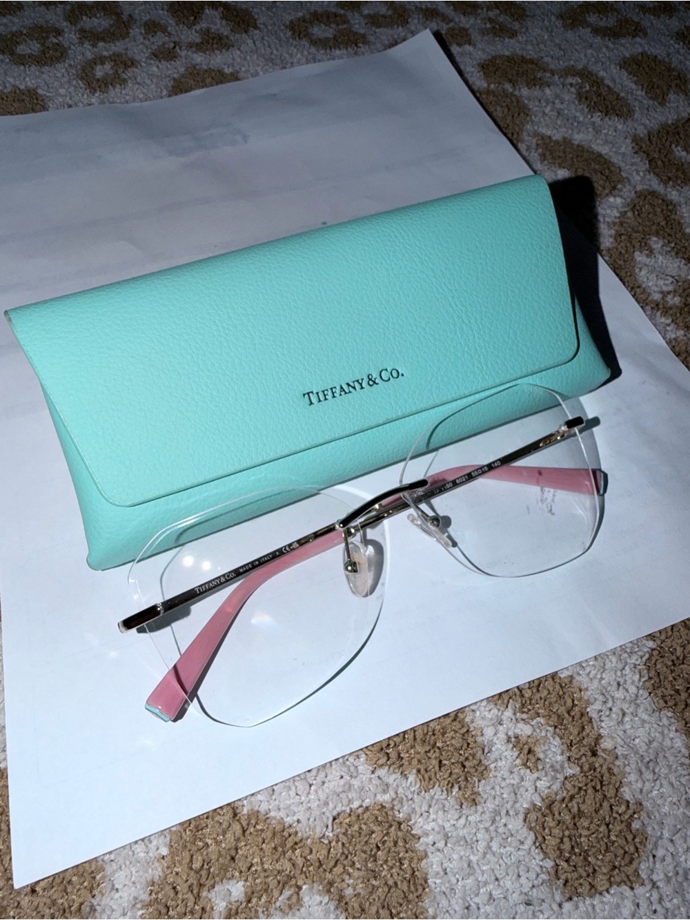 Tiffany & Co. Rimless Glasses with Pink Temples and Gold Accents